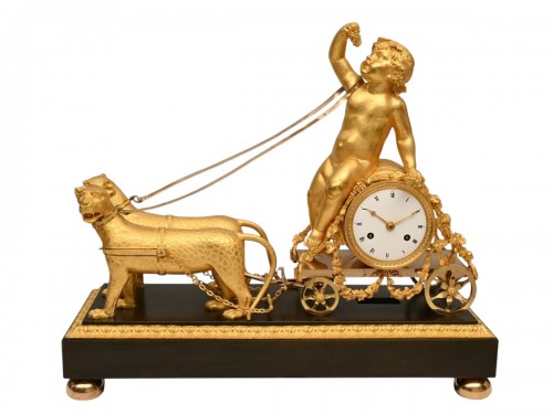 A very rare Empire mantle clock