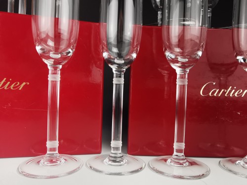 Verrerie, Cristallerie  - Cartier  - Ensemble de 12 Flûtes à Champagne en cristal modèle "must"