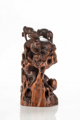 A Boxwood Okimono Depicting A Group Of Monkeys With An Octopus - 