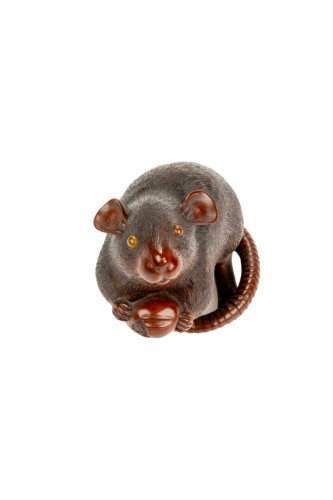 A Boxwood Okimono Depicting A Mouse Holding An Acorn