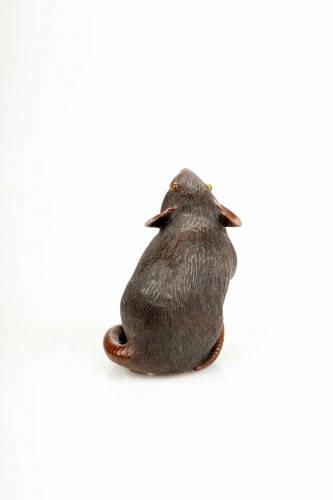 Asian Works of Art  - A Boxwood Okimono Depicting A Mouse Holding An Acorn