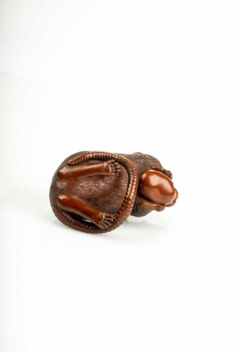  - A Boxwood Okimono Depicting A Mouse Holding An Acorn