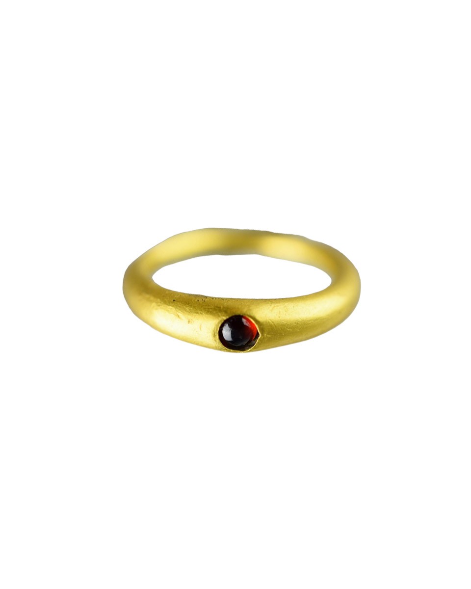 Ancient gold finger-ring set garnet. AD. a century with Roman, 3rd