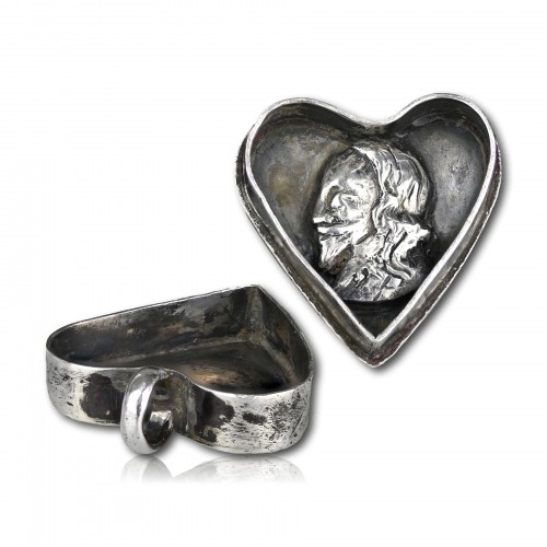 A Charles I silver heart shaped royalist locket - 