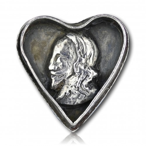 A Charles I silver heart shaped royalist locket - 