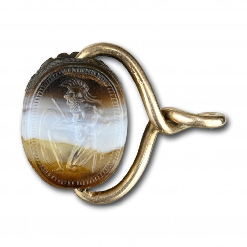 Ancient Art  - Banded agate scarab with a kneeling warrior