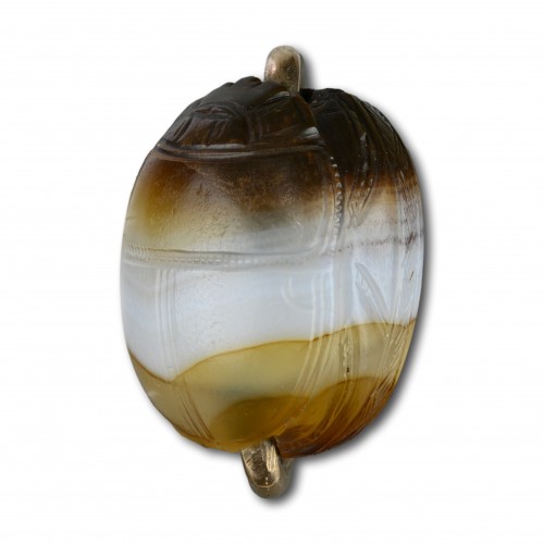 BC to 10th century - Banded agate scarab with a kneeling warrior