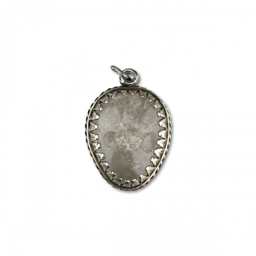 Silver mounted rock crystal amulet