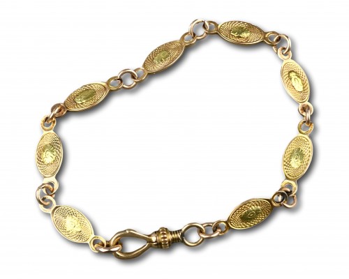  - Vari-coloured, high carat gold bracelet