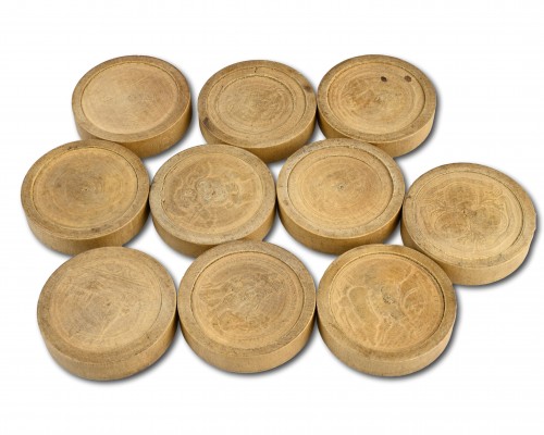 Twenty one stained and natural pear wood games pieces - 