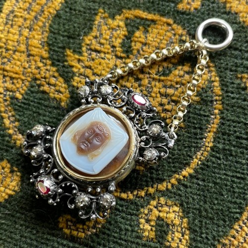  - Silver &amp; gold pendant with diamonds, rubies and a cameo of Veronica’s veil