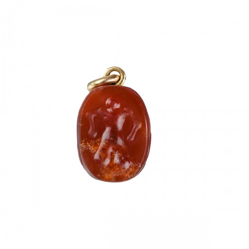 Etruscan carnelian scarab with antique gold mount 4th - 3rd century BC.  