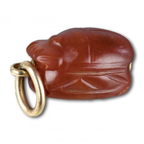 Etruscan carnelian scarab with antique gold mount 4th - 3rd century BC.   - 