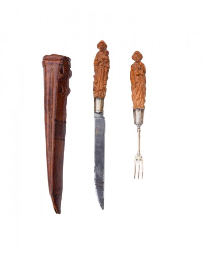 Pair of allegorical boxwood handled cutlery, Netherlandish mid 17th century