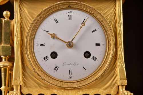 La Lectura, a French Empire mantel clock in gilt bronze, ca, 1800 - 