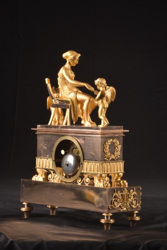 Cupidon et Venus,, pendule de cheminée Empire en bronze doré - Empire
