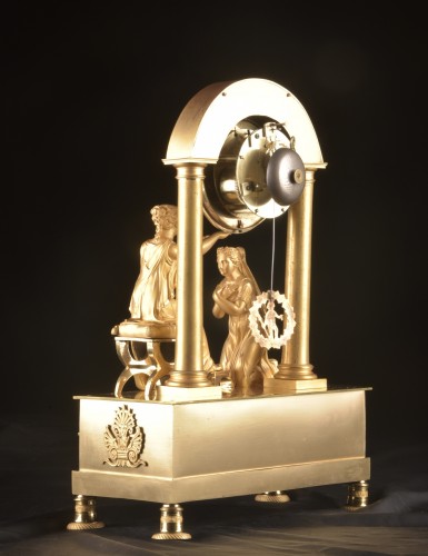 Antiquités - Pendule de cheminée Empire, « Le couronnement de la vertu » par Drouot