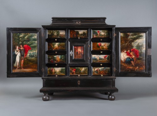 Furniture  - A 17th century Antwerp ebony cabinet with painted panels