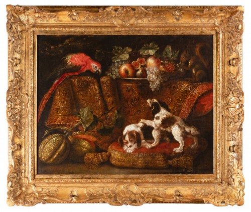 Still life with macaw, squirrel and spaniels - attributed to Reynaud Levieu