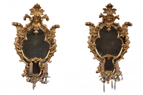 Pair Of Antique Mirrors In Carved And Gilded Wood