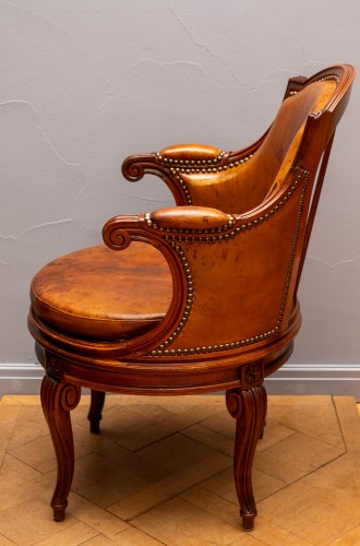 A Louis XVI Rosewood And Leather Upholstered Rotating Fauteuil De Bureau - Seating Style Louis XVI