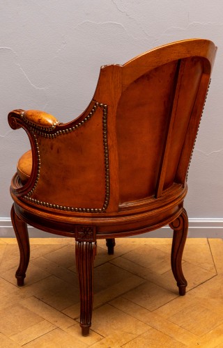 Seating  - A Louis XVI Rosewood And Leather Upholstered Rotating Fauteuil De Bureau