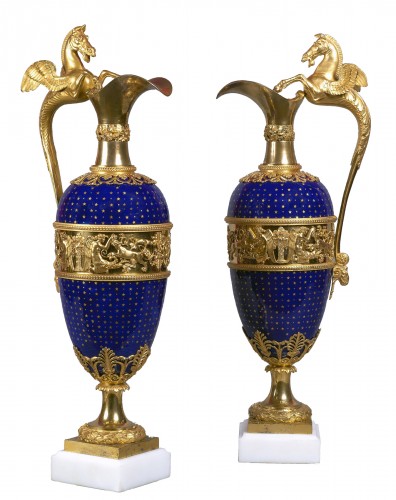 A pair of Louis XVI gilt bronze mounted blue enamel ewers