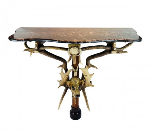 A 19th century Black Forest antlers console with marble top