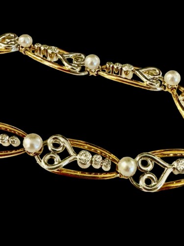 Gold, platinum, diamonds ans natural pearls bracelet circa 1920 - 