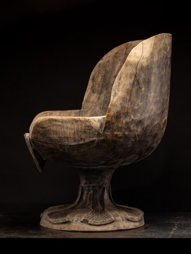 Four  hardwood chairs hand-carved out of one solid block  - Seating Style 