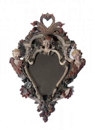 Miroir en bois sculpté et peint