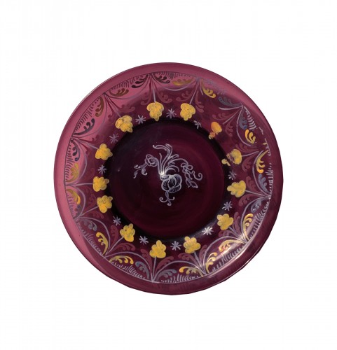 A enamelled amethyst glass plate