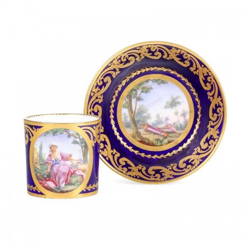 Sèvres porcelain litron cup and saucer with pastoral decoration