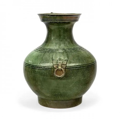 Large green glazed earhenware jar with taotie masks